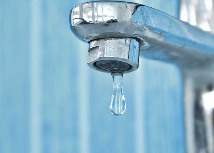 Water running from a bathroom faucet