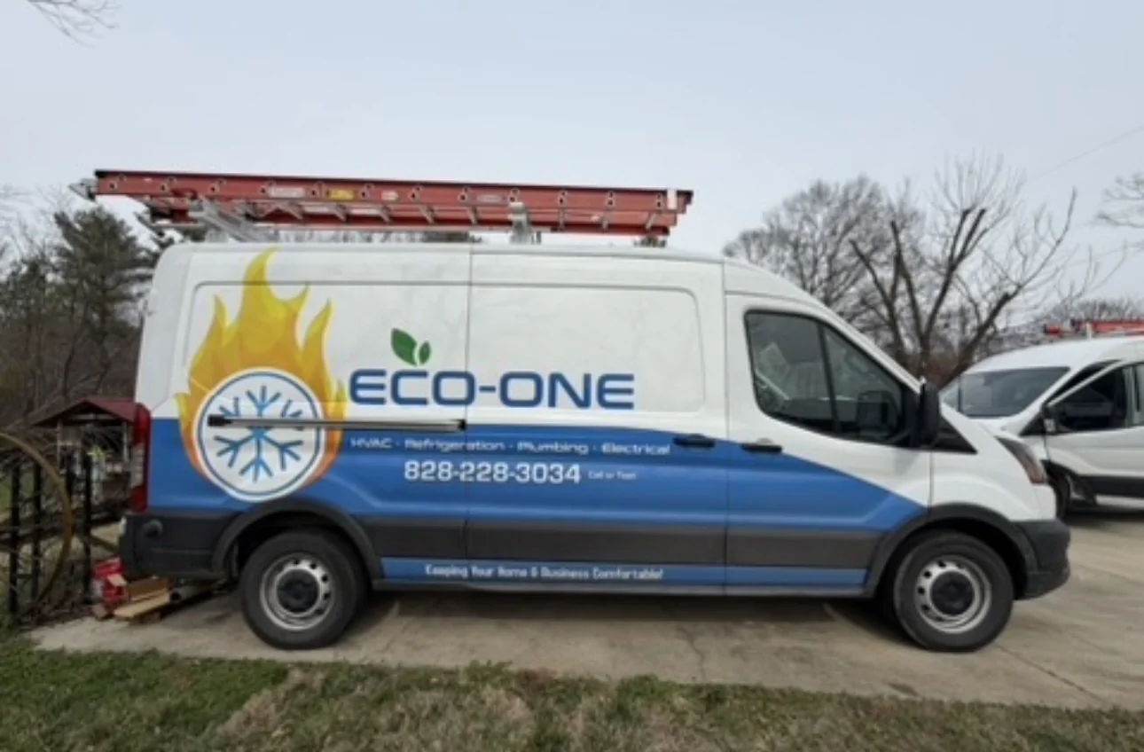 Side view of an Eco-One service van with HVAC, refrigeration, plumbing and electrical branding