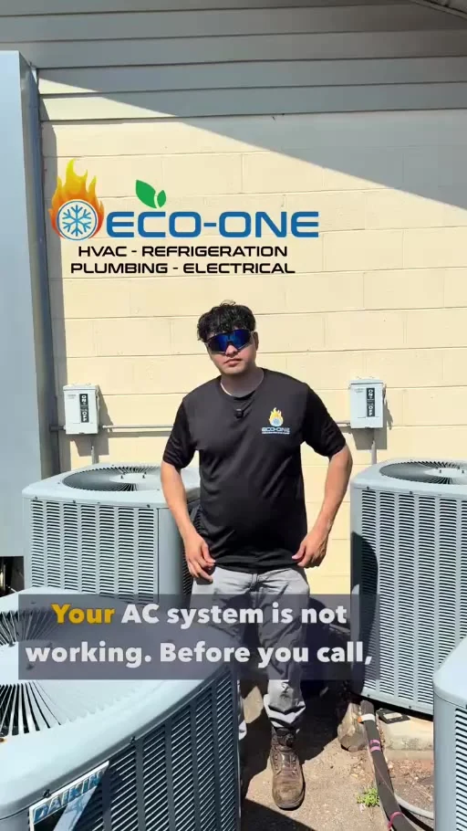 Eco-One technician beside outdoor AC units answering common air-conditioning questions